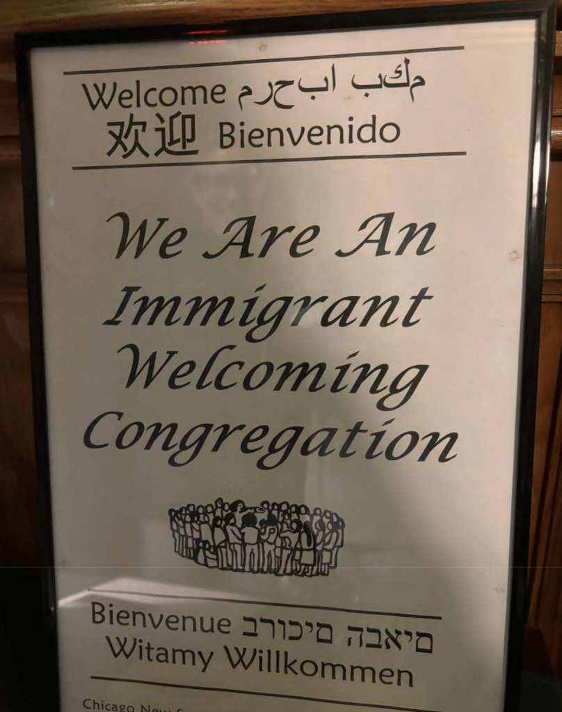 Sign that says "We are an immigrant welcoming congregation"